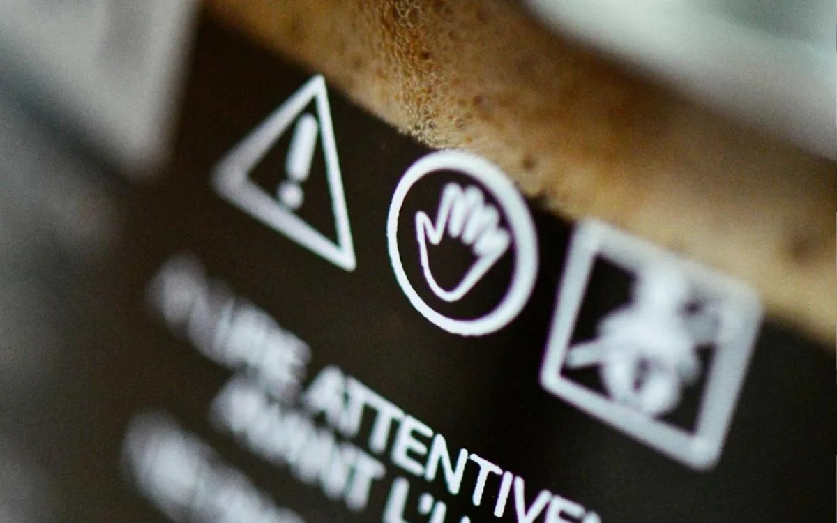 Close-up of caution symbols on product packaging (photo: Unsplash)